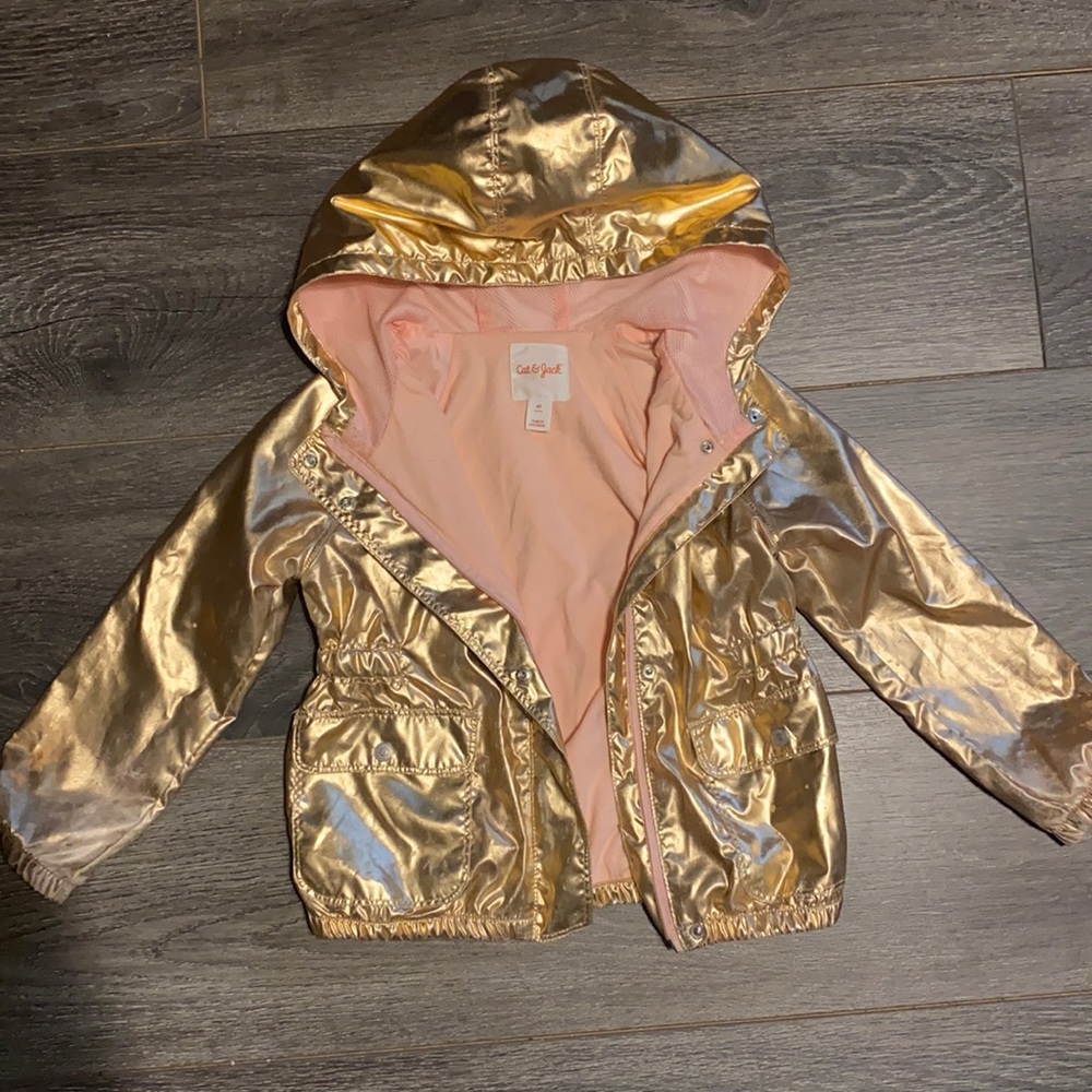 A gold Cat & Jack rain jacket.